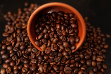coffee beans on stone background, close-up