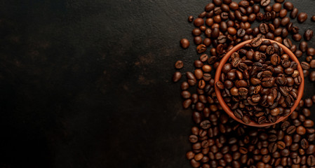 coffee beans on stone background, with copy space for your text