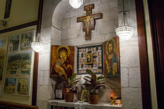Antakya, Hatay / Turkey : October 30 / 2019 : close view of the offerings corner with paintings of mother mary and jesus at catholic church of antioch