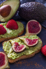 avocado or guacamole toast with berries