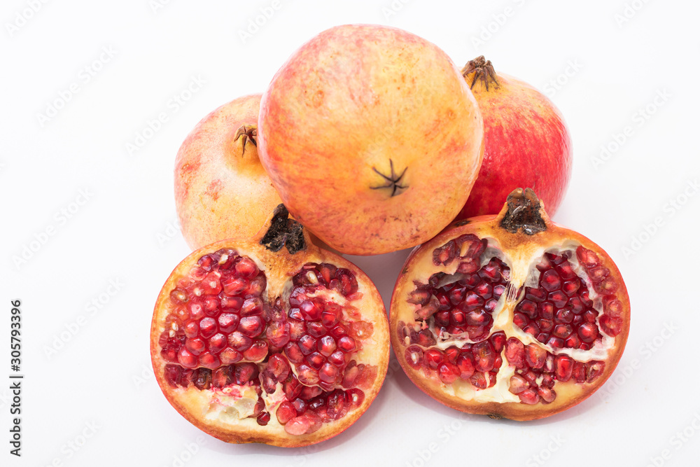 Wall mural fresh ripe pomegranate isolated on white background - Wall murals