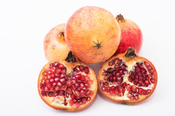 fresh ripe pomegranate isolated on white background