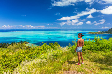 Bora Bora Tahiti cruise travel shore excursion tourist woman hiking on hike trail top view of...
