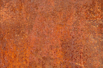 Abstract background texture of an old shabby rusty sheet of metal.