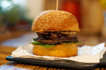 Meaty hamburger in a restaurant