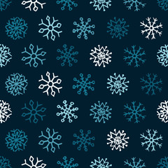 Seamless background of hand drawn snowflakes