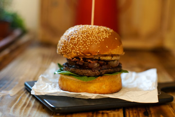 Meaty hamburger in a restaurant