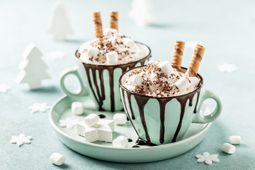 Hot chocolate festive dessert with whipped cream or ice cream
