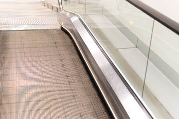 View of the travolators from the bottom up in the shopping center. A stepless escalator facilitates...