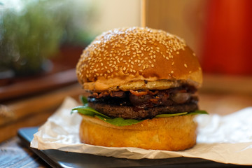 Meaty hamburger in a restaurant