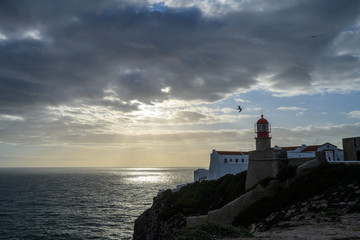 Fototapeta na wymiar lighthouse mood on the west coast of the algarve in portugal