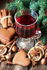 Mulled wine with gingerbread cookies. Christmas composition