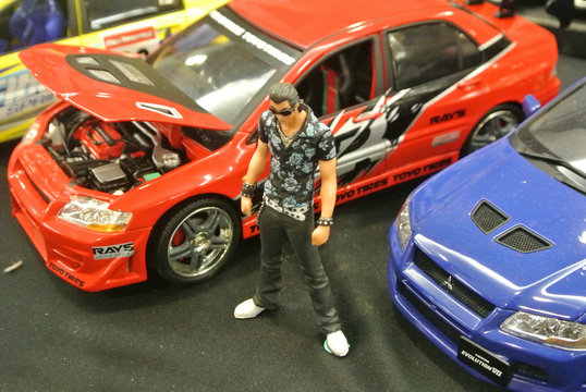 KUALA LUMPUR, MALAYSIA - MARCH 30, 2017: Small scale street race car model with its race driver displayed by collector. Its is based on famous Japanese comic & television character. 