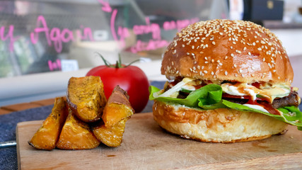Meaty hamburger in a restaurant