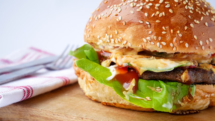 Meaty hamburger in a restaurant