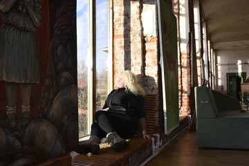 portrait of girl in front of a wall