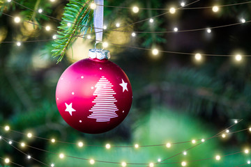 Christmas decoration on fir tree. Christmas lights background