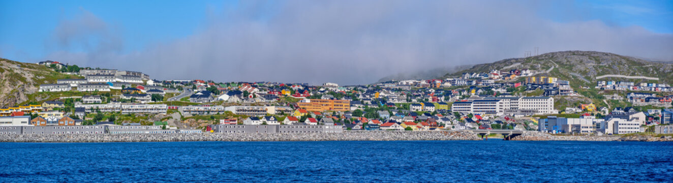 Panoramic view of northern part of Hammerfest, the northernmost town in the world, as seen from the bay. Kvaloya island, Finnmark, Norway.