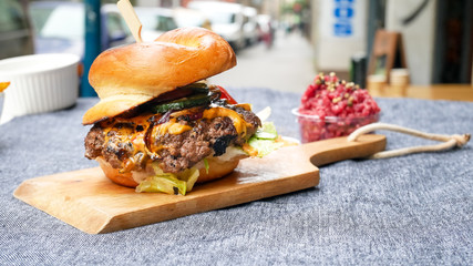 Meaty hamburger in a restaurant