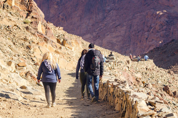Sinai Peninsula, Egypt, May 9, 2019: Pilgrims descend from Mount Moses at sunrise
