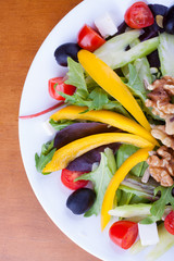 Fresh healthy raw green salad in a plate
