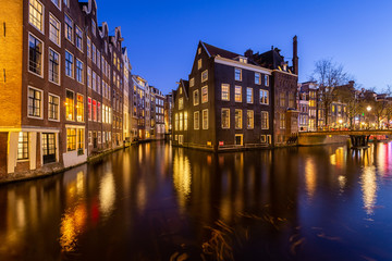 Red light district medival building at night. Amsterdam, Netherlands