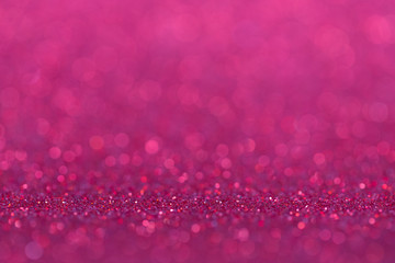 Pink abstract shiny background. Bright blur background of small sparkles