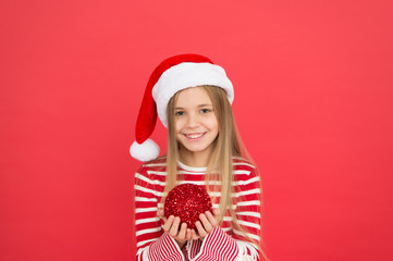 Beautiful detail. Positivity concept. Cheerful mood. Christmas party. Winter holidays. Playful mood. Christmas celebration ideas. Child Santa Claus costume hat. Happy smiling face. Shine and glitter