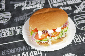 Meaty hamburger in a restaurant