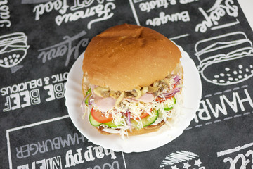 Meaty hamburger in a restaurant