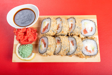Baked roll breaded. with various fillings. With ginger and wasabi.