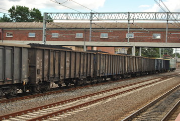 Fototapeta premium Train with many coal wagons, Tczew railway station, Poland. 