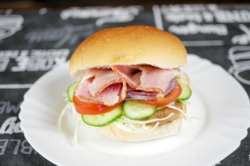 Meaty hamburger in a restaurant