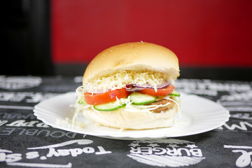 Meaty hamburger in a restaurant