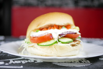 Meaty hamburger in a restaurant