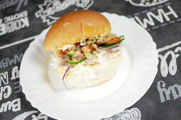 Meaty hamburger in a restaurant