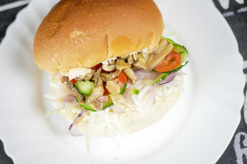 Meaty hamburger in a restaurant