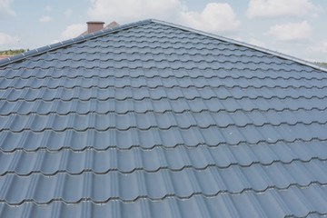 Corrugated metal roof and metal roofing. Modern roof made of met