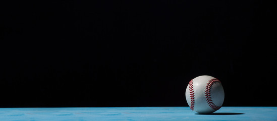 Baseball Ball On  Blue Wooden Table