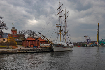 Fototapeta na wymiar STOCKHOLM, SWEDEN - 2 NOVEMBER 2019: Af Chapman is a full-rigged steel ship moored on the western shore of the islet Skeppsholmen in central Stockholm, Sweden