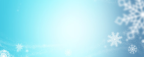 Winter background with white snowflakes and copy space.
