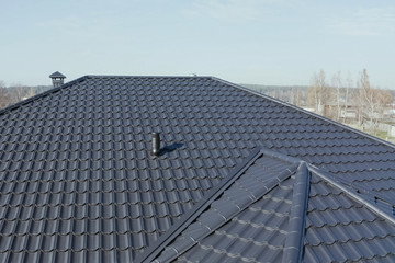 Corrugated metal roof and metal roofing. Modern roof made of met