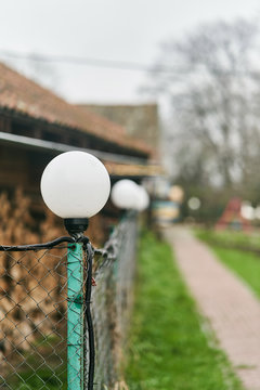 White lamp on the fence in the village