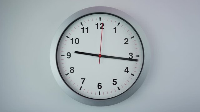Gray clock beginning of time 09.00 am or pm, Time lapse 60 minutes moving fast on white background.