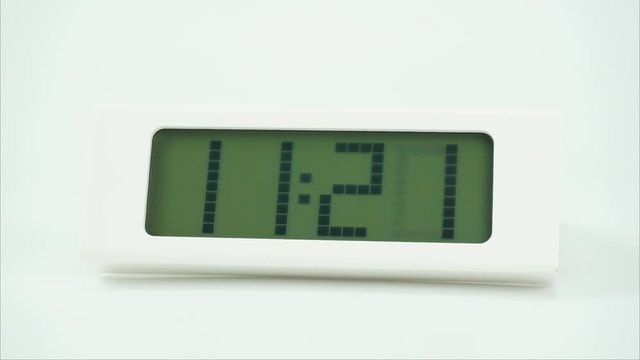 Countdown clock for the new year, Twelve o'clock Digital alarm White clock on White background, Time lapse 60 minutes, Time concept.