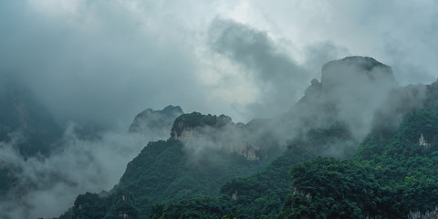 Tianmen mountains covered in early morning fog