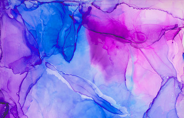 Trendy ethereal light blue, pink and purple alcohol ink abstract background. Bright liquid watercolor paint splash texture effect illustration for card design, banners, modern graphic design