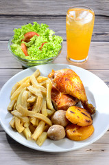  roast chicken with french fries steamed potatoes, salad and juice