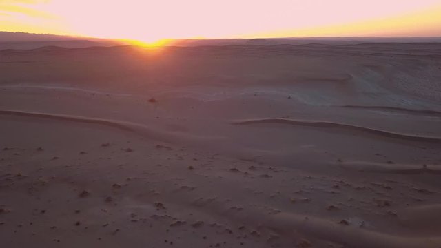 Desert sand dunes in sunset