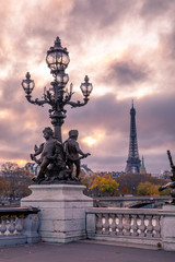 Paris, France - November 24, 2019: Eiffel tower viewed from Alexandre III bridge in Paris